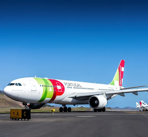 A TAP Air Portugal airliner on the airport tarmac