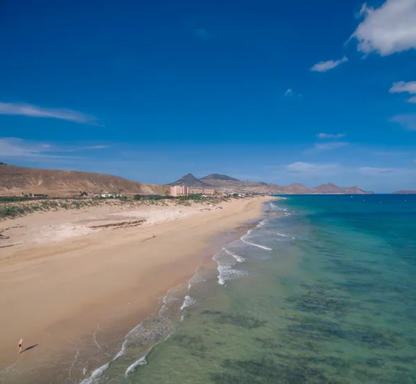 Aerial view of Porto Santo's long sandy beach in summer sunshine